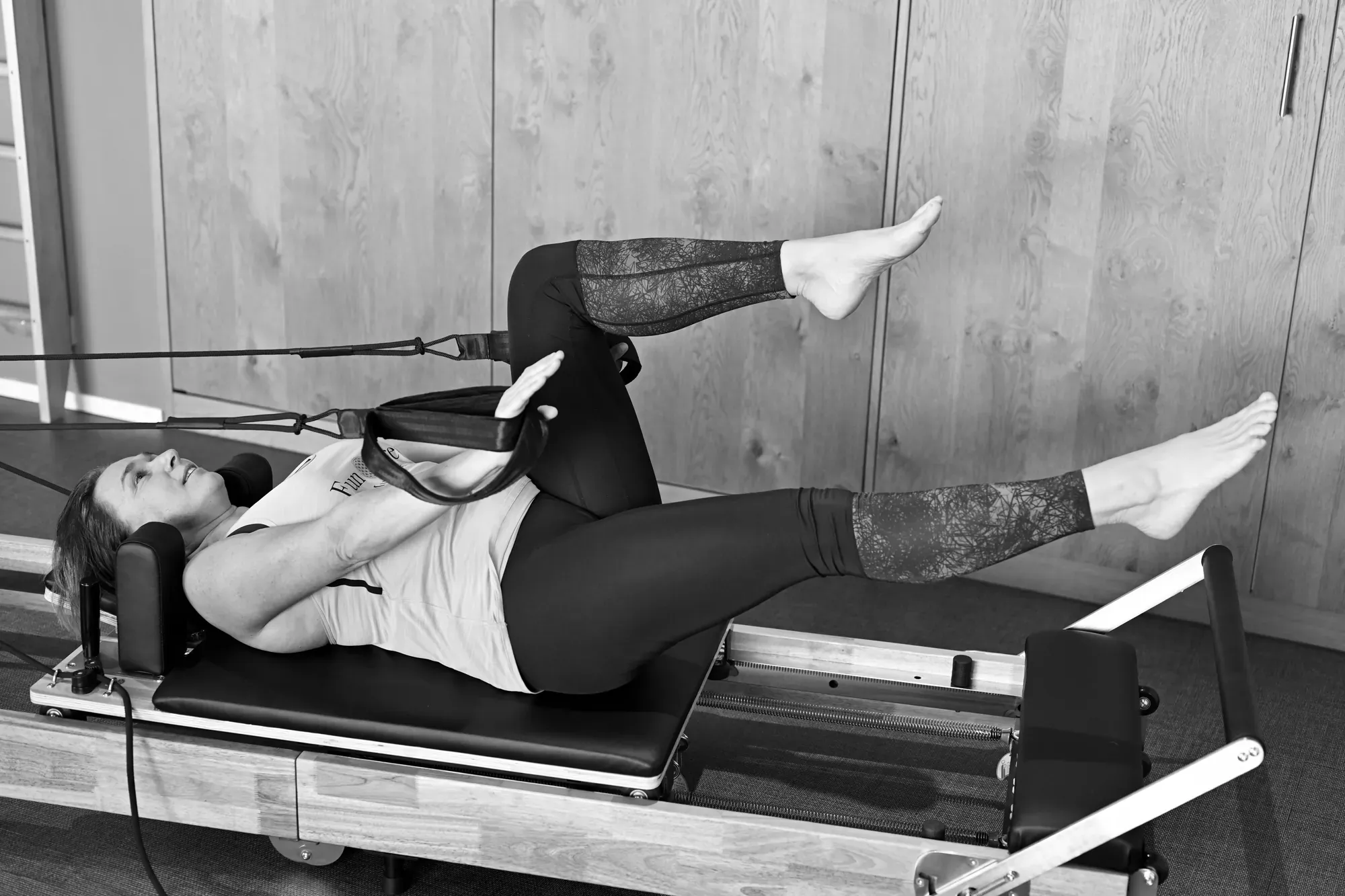 Pilates-Übung in Rückenlage